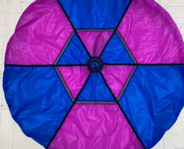 Round blue and pink segmented fabric disc